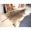 A genuine (large) Zebra skin mat in great condition,fabulous in your lapa, informal living areas