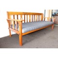 A very charming 3-seater solid Oregon daybed with an upholstered cushion - perfect for sun room!
