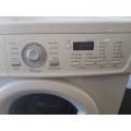An awesome white LG Intellowasher 7.2kg front loader washing machine model: WD-10160F