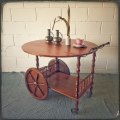 Amazing vintage "Wagon wheel" tea/ drinks trolley with drop-leaf sides and three cup/ flask holders