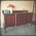 An exquisite LARGE vintage side server with pad foot legs and stunning carved wooden rosettes!