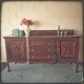 An exquisite LARGE vintage side server with pad foot legs and stunning carved wooden rosettes!