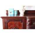 An exquisite LARGE vintage side server with pad foot legs and stunning carved wooden rosettes!