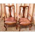 Two beautiful carved back vintage solid Oak armchairs/ carvers w leather seats - stunning!
