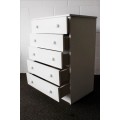 A lovely white veneer 5-drawer chest of drawers in good condition - perfect for extra packing space