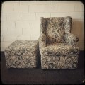 A wonderful upholstered rocker armchair with a matching ottoman - both in good condition!!