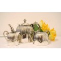 A gorgeous antique WH & Son Sheffield silver plated tea set incl teapot, sugar bowl & creamer.