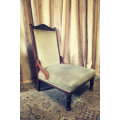 **RS17**  A hand-carved antique Victorian slipper/ nursing chair upholstered in a soft green fabric