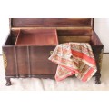 **RS17** A solidly built solid stink-wood ball & claw kist w/ a smalls shelf & brass embellishments