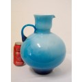 A superb vintage Retro Kanawha glass blue with white interior "pitcher" vase.