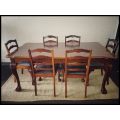 A wonderful vintage ball & claw dining room suite with 6x fabulous carved and upholstered chairs