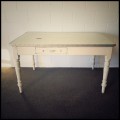 **RS17** A oregon under cream paint single drawer kitchen table with a turned legs and a green top
