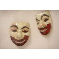 Two stunning mini ceramic masks in a lovely wooden boxed frame.