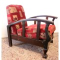 **RS17** A vintage cushioned Imbuia ball & claw arm chair, fantastic in a study, bedroom, lounge.