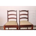 **RS17** Two solidly made vintage/ antique? solid teak occasional chairs in a sand colour fabric