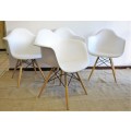 **RS17** Stunning modern round-bottom occasional chairs with a sleek design and wooden legs