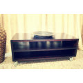A stunning stylish wooden TV stand on wheels with place for your entertainment centre