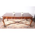 A vintage stink-wood scalloped edge ball and claw cross-brace 6-8-seater D/Table. Lifespace Sale