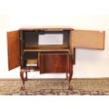 An awesome and solidly made vintage solid Imbuia ball and claw Radiogram cabinet