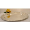 A gorgeous large silver plated platter with an elegant design.