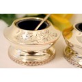 A set of gorgeous EPNS silver plated mustard pots with cobalt blue glass bowls and a spoon.