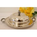 A gorgeous vintage Seranco silver plated lidded breakfast butter dish with an ornate lid.