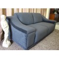 A fantastic ultra modern, "new" extremely well made (195cm long) 2 seater grey upholstered couch.