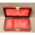 A beautifully made wooden Chinese jewellery box with brass latch and hinges.