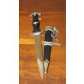 An amazing vintage ornamental replica German "SS" dagger for display purposes only. Stunning!!!