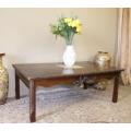 A large beautiful centre coffee table with stunning carved legs and sides. Lifespace Sale