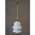 A beautiful white glass single pendant ceiling light, perfect in formal rooms.