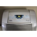 A stylish De Longhi Pinguino PAC C110 portable air conditioner in full working order.