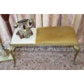 A lovely vintage marble and brass telephone table w/ a cushion, great in informal rooms!