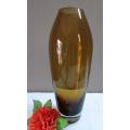 A stunning, eye catching amber coloured glass vase!! Beautiful on display!!
