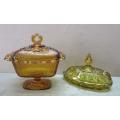 Two lovely lidded coloured glass butter dishes, gorgeous on a breakfast table!