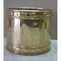 A solid brass pot planter with punched detailing. Gorgeous in all living areas! Lifespace Sale