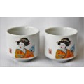 An awesome pair of ceramic rice wine cups, with an image of a woman on them. Lifespace Sale