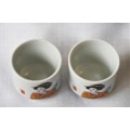An awesome pair of ceramic rice wine cups, with an image of a woman on them. Lifespace Sale