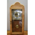 A beautiful Oak and brass battery operated chiming (speaker) wall clock, working. Lifespace Sale