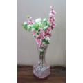 A stunning, eye catching pink glass vase!! Beautiful on display!! Lifespace Sale