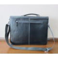 A beautiful genuine leather ladies hand bag with place for books, cards etc