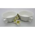 A lovely pair of white porcelain double handled soup bowls.  Lifespace Sale