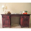 A gorgeous vintage Mahogany two-drawer, two cupboard library/ ladies writing desk w/ ornate handles