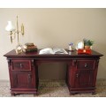 A gorgeous vintage Mahogany two-drawer, two cupboard library/ ladies writing desk w/ ornate handles
