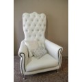 An exceptional oversized King wing back chair in a durable white faux leather. Lifespace Sale