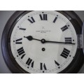 BARGAIN CLOCKS!!A vintage round Schulitis Schwar clock in a wood wall casing. Lifespace Sale
