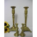 BARGAIN! A wonderful collection of 4 different shapes and sizes brass candle holders