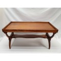 A carved Oak coffee table in good condition.Perfect in informal areas-Xmas Sale
