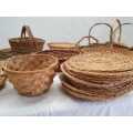 An assortment of table/ flower/ bread baskets, paper plate holders