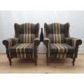 A pair of vintage Queen Anne footed Wingback upholstered arm chairs